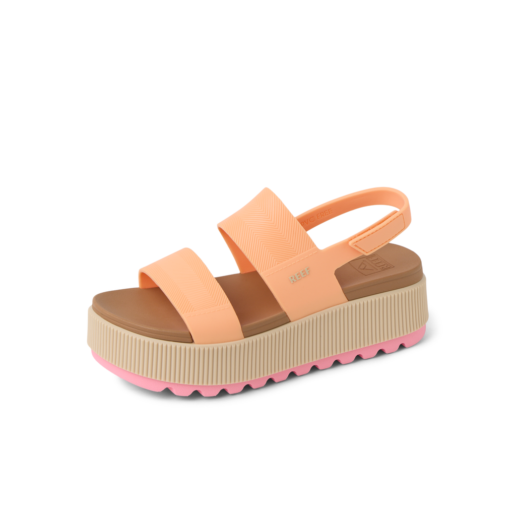 Water Vista Higher women's sandal facing left with orange chiffon straps, platform sole, and arch support for comfort