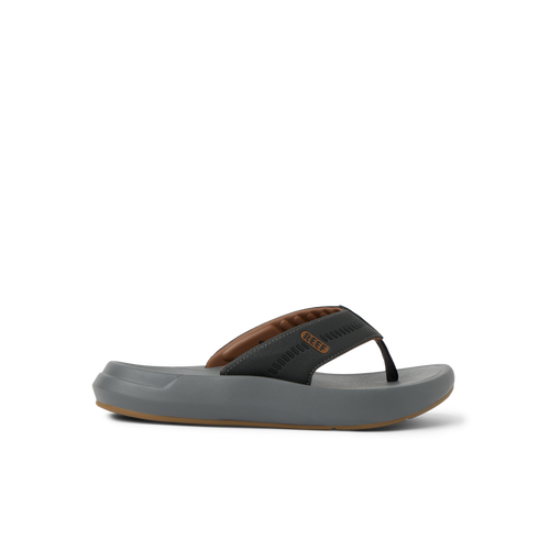 Cruiser men’s flip flop facing left, showing cushioned footbed and soft arch support in black and brown colors.
