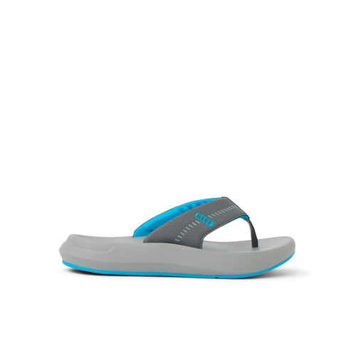 Cruiser flip flop facing right with charcoal gray straps, aqua accents, and cushioned sole for beach comfort by REEF.