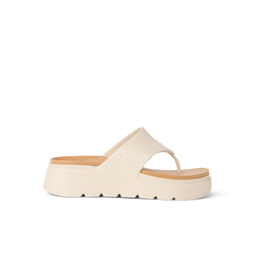 Side view of the white Cali Laguna platform sandal showcasing extra cushion and enhanced arch support for beach comfort.