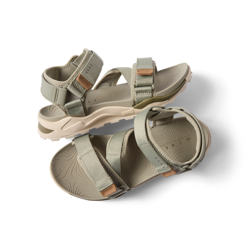 Top view of men's Cross-Shore sandal in tan with adjustable straps, cushioned sole, and arch support facing right
