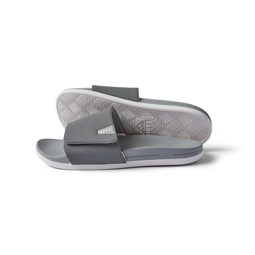 Side and bottom views of gray Cshn Phantom Slide with soft-rebound cushioning and arch support for beach comfort
