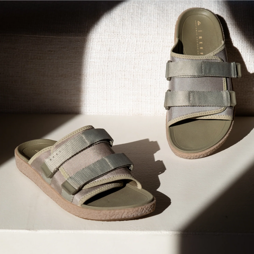 Montauk sandals in sage facing right and left, showing straps and cushioned arch support, surf-inspired comfort design.