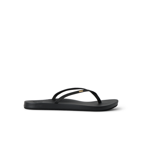 Cushion Slim black flip flop facing left, showing side profile with anatomical arch support and soft cushioning.