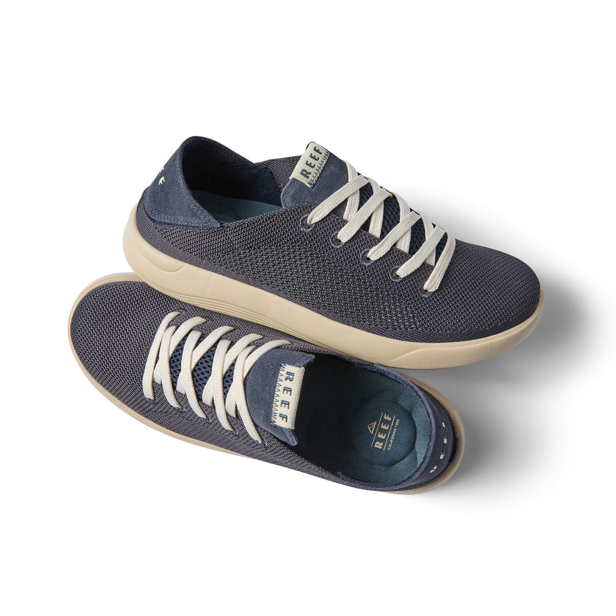 Neptune men's sneaker in true navy facing right, lightweight with cushioned sole and anatomical arch support for beach comfort.